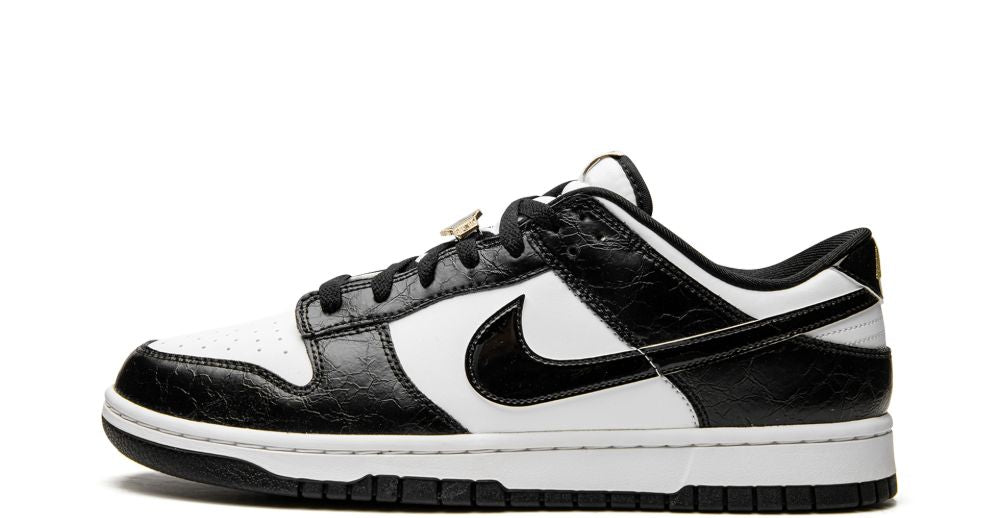 Nike Dunk Low SE “World Champ” – oldalnézet, fehér/fekete bőr overlay-ek