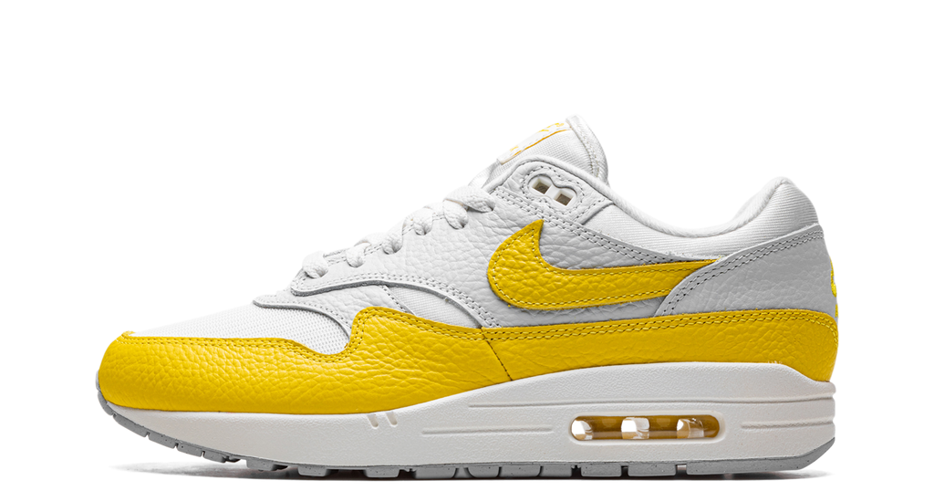 Nike Air Max 1 Tour Yellow – oldalnézet, fehér mesh alapszín és sárga Swoosh.